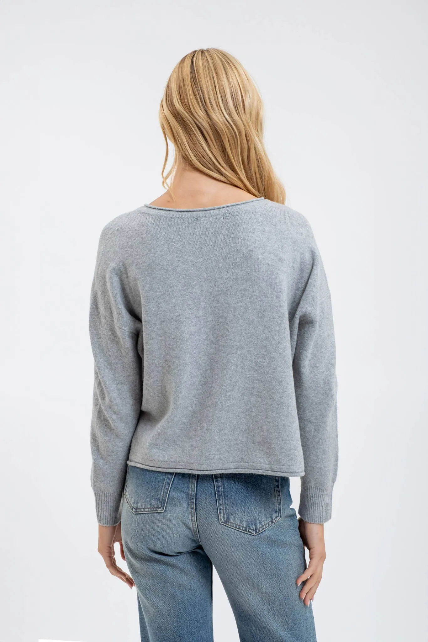 EXPOSED SEAM SPLIT NECK KNIT SWEATER
