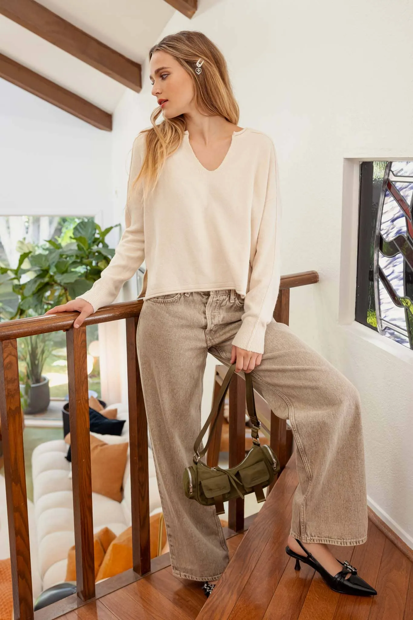 EXPOSED SEAM SPLIT NECK KNIT SWEATER
