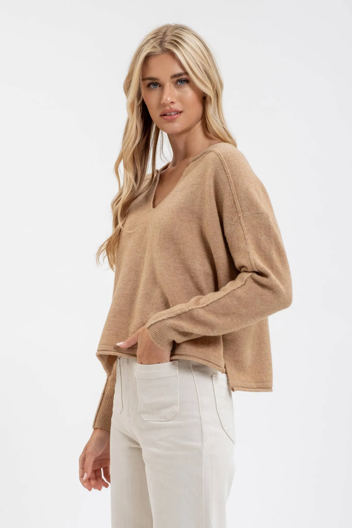 EXPOSED SEAM SPLIT NECK KNIT SWEATER